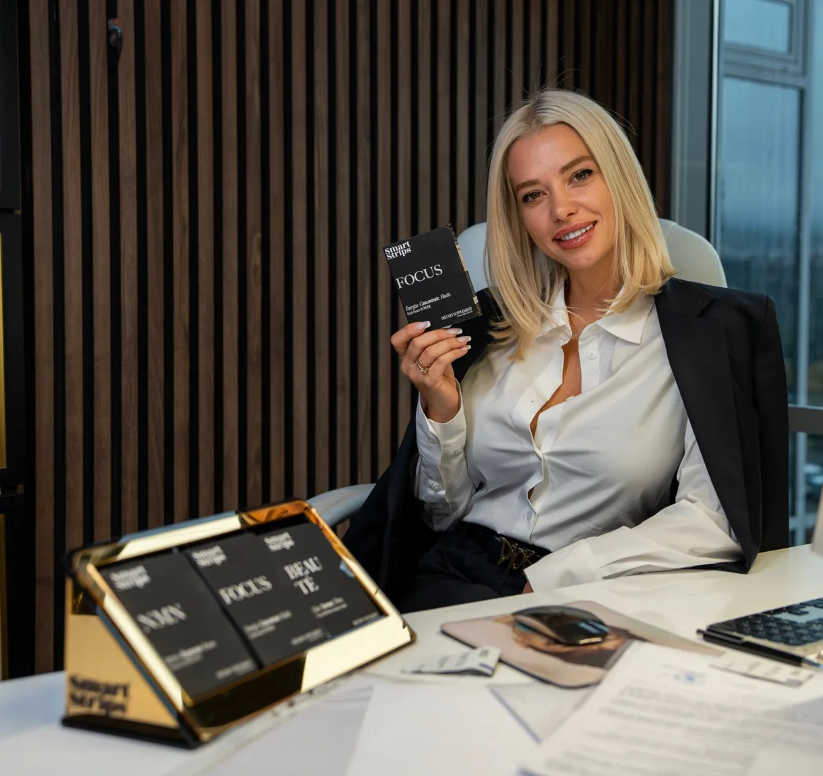 Elina Ivanova-Atanassov at her desk with Smart Strips