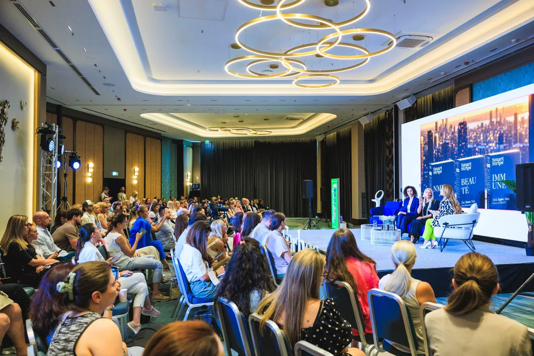 A full hall at the Forbes Health & Longevity Forum during Elina's panel