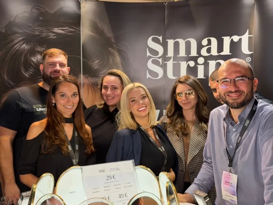 Elina Ivanova-Atanassov with the Smart Strips team at the expo